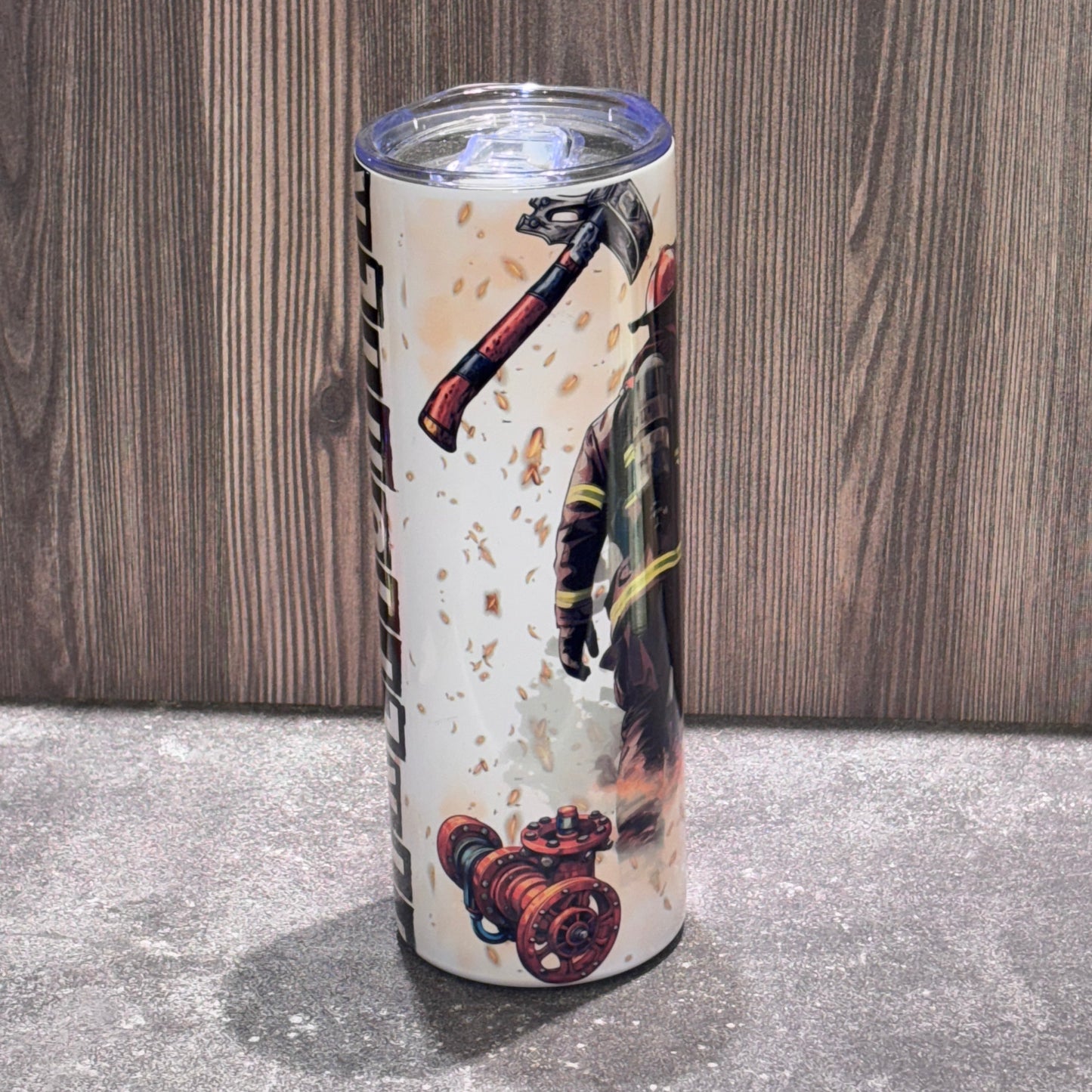 20 oz stainless steel skinny tumbler featuring firefighter-themed artwork and bold FIREFIGHTER lettering with lid and straw.